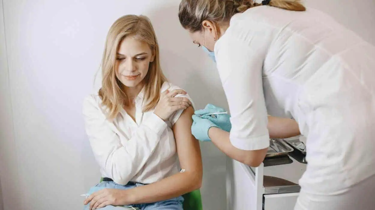 Woman doctor gives a vaccine to patients