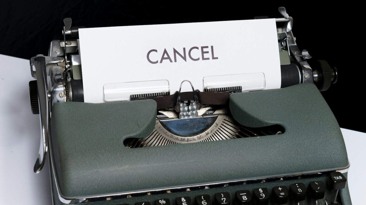 green and white typewriter on black textile